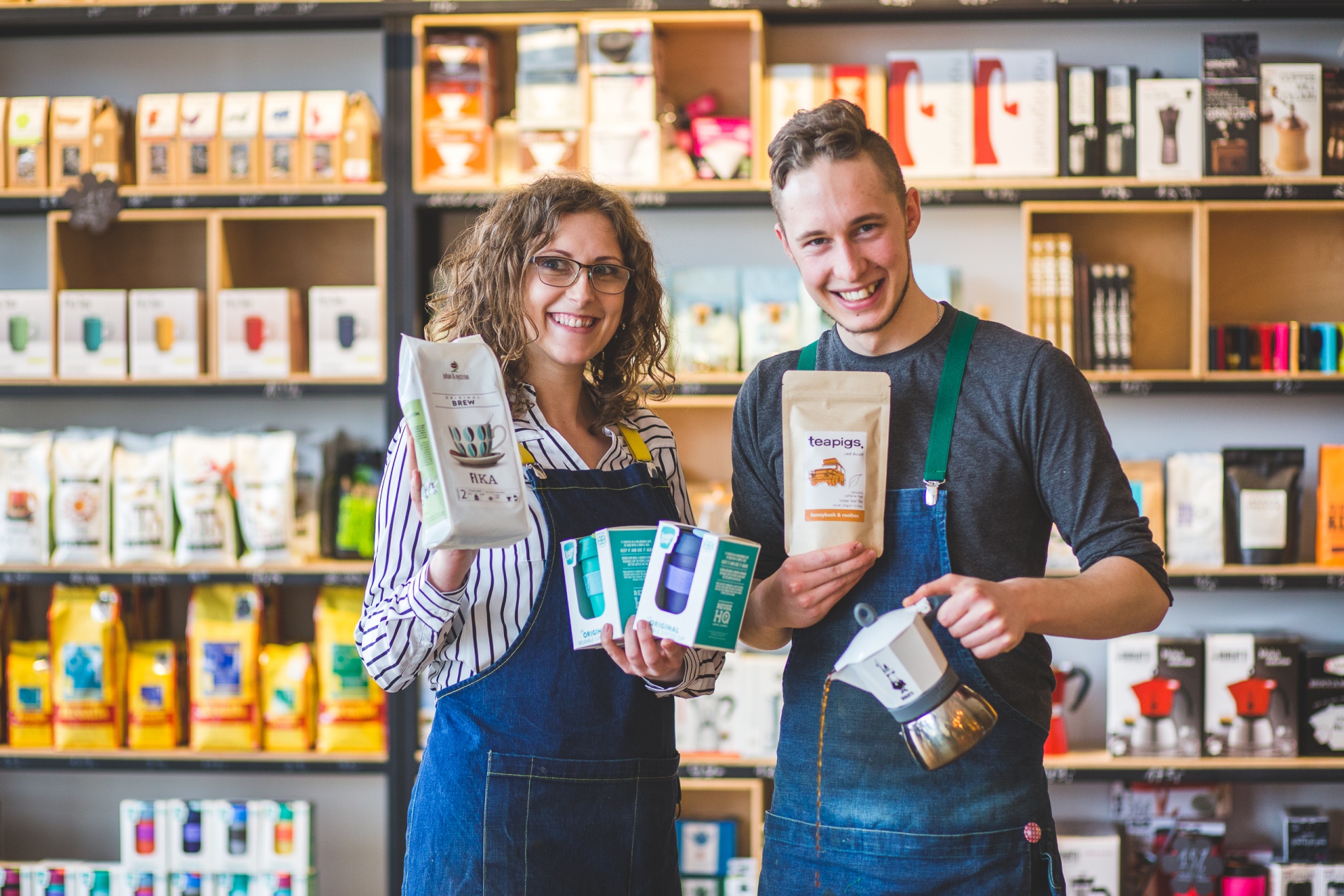 Baristas presenting coffee and accessories